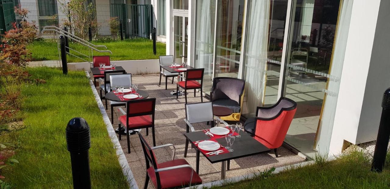 Zenao Montreuil- Croix De Chavaux Apartment มงเทรย ภายนอก รูปภาพ